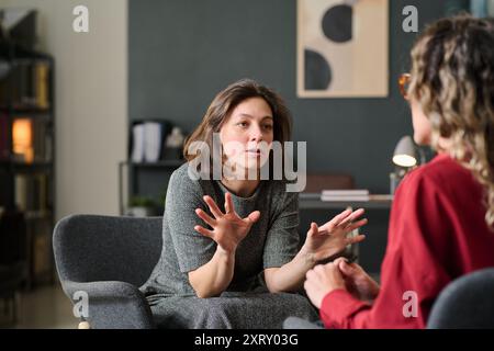 Engaging In Therapeutic Conversation During Session Stock Photo
