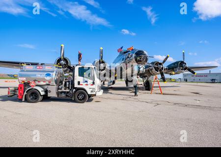 Boeing B-17 Flying Fortress vintage bomber plane being refulled, World Fuel Services fuel truck, Sentimental Journey, World War II restored B17 USA Stock Photo