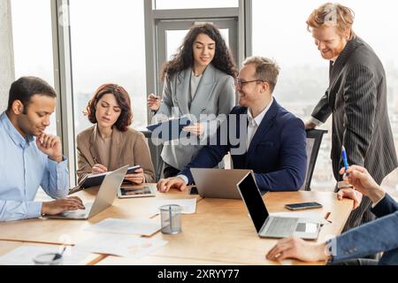 Business Professionals Working Together in a Modern Office Meeting Stock Photo