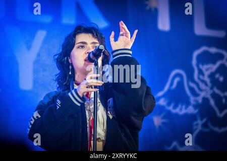 Roskilde, Denmark. 04th, July 2024. The British indie rock band The Last Dinner Party performs a live concert during the Danish music festival Roskilde Festival 2024 in Roskilde. Here singer Abigail Morris is seen live on stage. Stock Photo