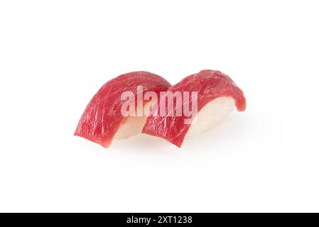 A high-quality image showcasing two pieces of fresh tuna nigiri sushi, expertly crafted with glistening red tuna placed over perfectly shaped sushi ri Stock Photo