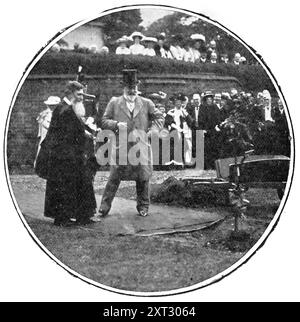 At The School That Has Left A Deep Mark On Great Britain, The Empire, And The World: The King planting his oak at Rugby School, 1909. 'His Majesty [King Edward VII] Shovelling Earth About The Roots Of The Young Tree, In The Close Under The Doctor's Wall. The King...declared open the new Speech Room, commanded an addition to the boys' &quot;hard-earned holidays,&quot; presented prizes. planted a young oak tree in the Close, and inspected the members of the Officers' Training Corps of the school. In the course of his reply to the address read by the head of the school, H. J. B. Clough, a grand-n Stock Photo