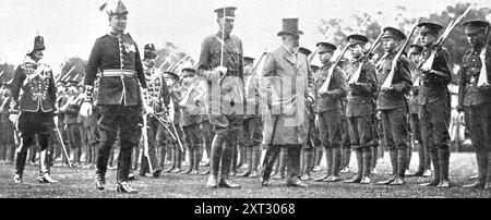 At The School That Has Left A Deep Mark On Great Britain, The Empire, And The World: The King at Rugby School - officers' training corps, 1909. 'Royal Interest In The Officers' Training Corps Of Rugby School: His Majesty [King Edward VII] Inspecting The Three Companies. The King...declared open the new Speech Room, commanded an addition to the boys' &quot;hard-earned holidays,&quot; presented prizes. planted a young oak tree in the Close, and inspected the members of the Officers' Training Corps of the school. In the course of his reply to the address read by the head of the school, H. J. B. C Stock Photo