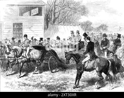 The Cambridgeshire Steeplechase, Cottenham: arrival of the Prince and Princess of Wales, 1870. 'The Grand National Hunt and Cambridgeshire Steeplechases took place at Cottenham, six miles from Cambridge...The party from Kimbolton [Castle], the Duke and Duchess [of Manchester], with the Prince and Princess [future King Edward VII and Queen Alexandra, travelled by train] to Oakington station, by Huntingdon and St. Ives. Here a number of carriages were in waiting; and the party, some in them and some on horseback, rode to the course, which is two or three miles from Oakington station. Their Royal Stock Photo