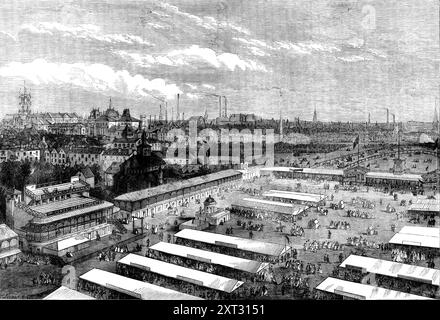 Meeting of the Royal Agricultural Society at Wolverhampton, 1871. 'The annual meeting...of the Royal Agricultural Society of England, was held this year at Wolverhampton...We give a View of the town and the ground occupied by the society for the show-yard. This was on the race-course. The extent of the sheds and pens, ranged in many lines, was in the aggregate about three miles. There were 363 stand[s] for the agricultural implements and the other articles exhibited; while the cattle-show numbered 400 bulls, oxen, and cows; 250 horses, and 600 sheep and pigs. The trials of traction-engines and Stock Photo