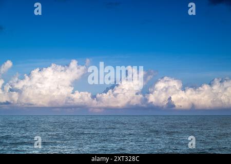 A dramatic sky filled with rapidly moving clouds. The clouds are layered and textured, creating a sense of depth and movement. Touchen, Yilan County, Stock Photo