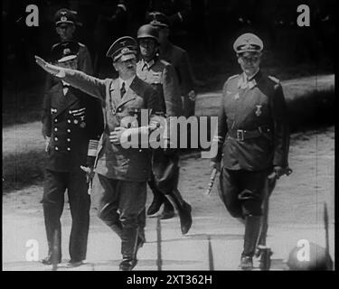 Adolf Hitler Saluting as He, Hermann Goering and Others Arriving at Compiegne to Receive the French Surrender, 1940. Second World War. 'The forest of Compi&#xe8;gne. Here, a place hallowed to all Frenchmen, the supreme commander of the allied armies of 1918, Marshall Foch, received the beaten German enemy...and concluded an armistice. But when in 1940 the Germans came to Compi&#xe8;gne it was in a very different mood. Now it was they who were the conquerors, having beaten France flat in a matter of weeks. Now, with his sense of the melodramatic, Adolf Hitler was forcing his terms on a stricken Stock Photo