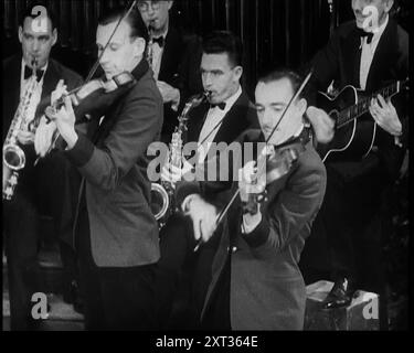 Jazz Band Playing a Tune, 1930s. From &quot;Time To Remember -  Some People in the Thirties&quot;, 1930s (Reel 1); documentary film about the 1930s, focussing on famous characters of the time. Stock Photo