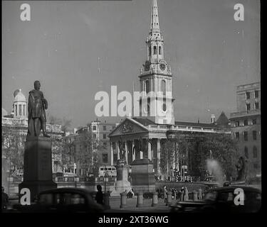 St Martin in the Fields Church on Trafalgar Square Viewed from the End of Cockspur Street With a Car and Several Pedestrians Visible Near the Statue of General Sir Charles James Napier, 1939. From &quot;Time To Remember -  The Reluctant Warriors&quot;, 1939 ( Reel 2); documentary about events of 1939 - preparations for war and then hostilities break out. Stock Photo