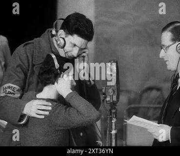 Parents Calling Evacuee Children in America Over the Radio, 1940. Britain during the Second World War: BBC radio programme connecting families. Presenter: &quot;Hello New York, this is London calling@And now with us [from USA] are Linda and Geoffrey Kalpen [?], and they're going to greet their parents in London, I think first we have a little word from Linda who's the young lady of the house&quot;. [Mother:] &quot;Hello Linda, how are you?&quot;. [Linda:] &quot;Alright&quot;. [Mother:] &quot;Are you and Geoffrey having a good time in America?&quot;. [Linda:] &quot;Yes&quot;. [Mother:] &quot;Th Stock Photo