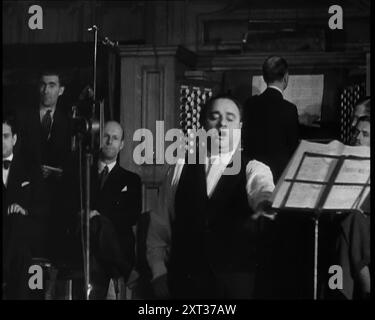 Beniamino Gigli Singing 'Largo' by Handel, 1930s. From &quot;Time To Remember -  Some People in the Thirties&quot;, 1930s (Reel 1); documentary film about the 1930s, focussing on famous characters of the time. Stock Photo