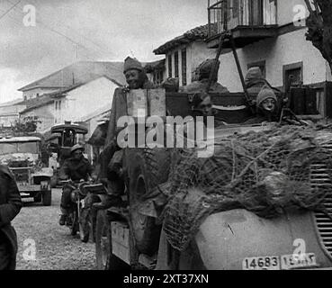 British Soldiers Retreating in Greece, 1941. Second World War. '...the British force that had disembarked at Athens could only be a token offering to aid the Greeks. Hardly spared from the western desert, it was puny in strength...For the British, once again, the old story of retreat'. From &quot;Time To Remember - Operation Barbarossa&quot;, 1941 (Reel 2); documentary film about events of 1941, on the Eastern Front and at Pearl Harbour. Stock Photo