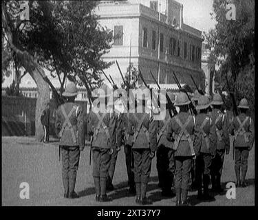 Soldiers Carrying Rifles Patrolling Outside the Egyptian Palace After the Assassination of the Governor General of Sudan Was Assassinated, 1924. From &quot;Time To Remember - A Trip To Europe&quot;, 1924 (Reel 3); a look at political and social life in Europe and beyond during 1924. Stock Photo