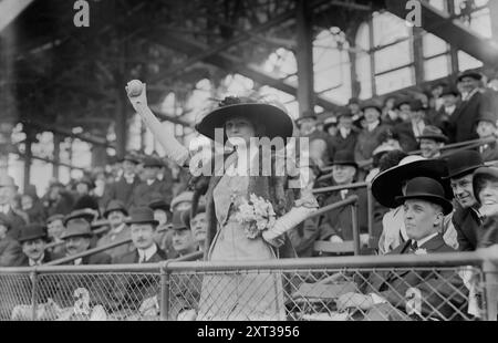 Miss Genevieve Ebbets, youngest daughter of Charley Ebbets, throws first ball at opening of Ebbets Field (baseball), 1913. Stock Photo