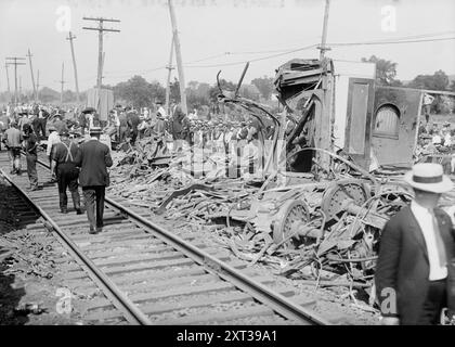 Wreck of Bar Harbor express, 1913. Shows people looking at wrecked railroad cars after a railroad accident in which the White Mountain Express crashed through two cars of the Bar Harbor Express, north of New Haven, Connecticut on Sept. 2, 1913. Stock Photo