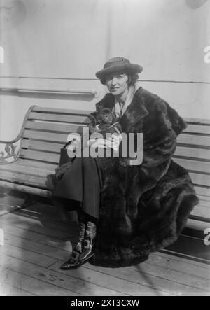 Mrs. Vernon Castle, between c1915 and c1920. Shows ballroom dancer Irene (Foote) Castle (1893-1969) who taught and danced with her husband, Vernon Castle (1887-1918). Mrs. Castle is holding a monkey. Stock Photo