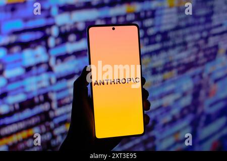 In this photo illustration, the Anthropic logo is displayed on a smartphone screen. Stock Photo