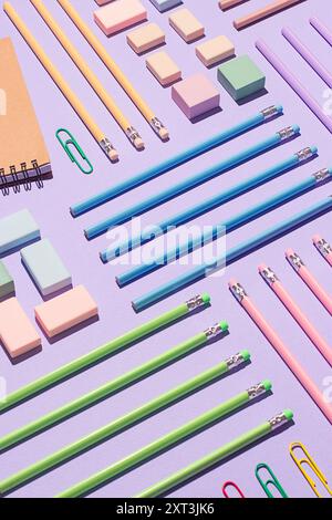 A neatly organized top view of school supplies, featuring pencils, erasers, notebooks, and paper clips on a vibrant purple surface. Stock Photo