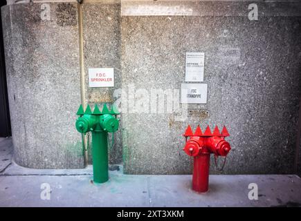 Set of standpipes, with metal on top to prevent sitting, in Chelsea in New York on Friday, August 2, 2024.  A standpipe is a dry line that the fire department connects to deliver water to upper, or in this case below ground, floors.  (© Richard B. Levine) Stock Photo