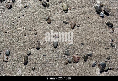 Background photography of stone and sand on the beach, rock; seashore; coast, coastline, shore, seaside, texture; pattern; detail; abstract, Scotland Stock Photo