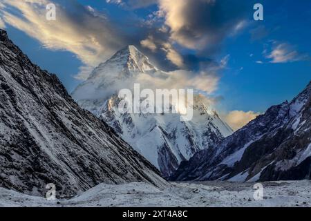 Clouds over the K2 peak, the second highest mountain in the world Stock Photo