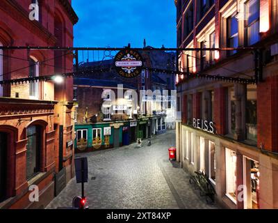 Elevated image looking down Mathew Street in the Cavern Quarter, home of the famous Cavern Club and numerous Beatles themed bars Liverpool UK. Stock Photo