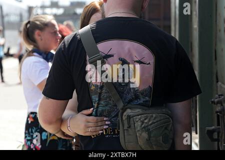 Non Exclusive: KRAMATORSK, UKRAINE - AUGUST 12, 2024 - A Ukrainian serviceman says goodbye to his partner on a railway station platform in Kramatorsk, Stock Photo