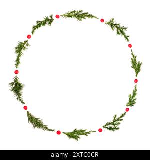 Winter solstice Christmas wreath with fir and holly berries on white background, Traditional festive symbol for the holiday season, greeting card. Stock Photo