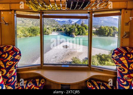 View from the luxurious compartment of the Alpine Classic Pullman Express of the confluence of the Vorderrhein and Hinterrhein rivers near Reichenau, Canton Graubünden. Alpine Classic Pullman Express on the route of the Glacier Express, Grisons, Switzerland Stock Photo