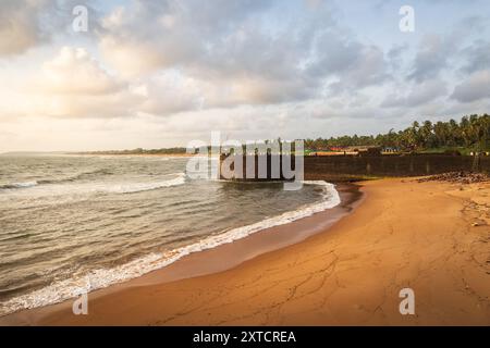 Aguada Fort in Candolim, Goa, India. Indian tourist visiting the Aguada fort Sinquerim. Taj Fort Aguada. seventeenth-century Portuguese era fort,Trave Stock Photo