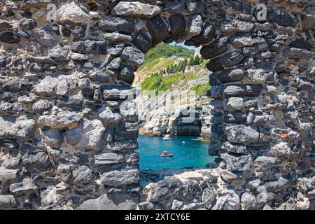 Look-through to the famous Byron's Cave (Italian: Grotta di Byron) in the Bay of Poets on the Ligurian coast in Porto Venere, Italy Stock Photo