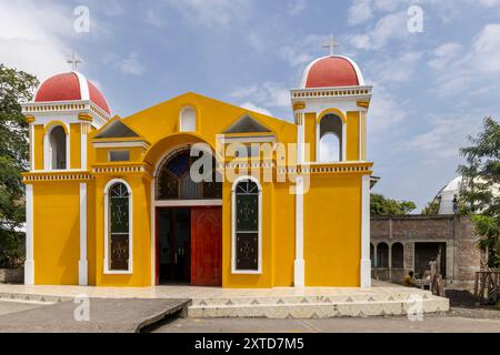 Little colorful yellow church at Ometepe island in Lake Cocibolca in southwest Nicaragua Central America Stock Photo