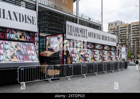 London, UK.  14 August 2024.  Official merchandise ('merch') stands in front of Brent Library outside Wembley Stadium ahead of Taylor Swift’s Eras Tour August concerts.  Taylor Swift performed at Wembley Stadium for three nights in June and will play five more nights commencing 15 August. Credit: Stephen Chung / Alamy Live News Stock Photo