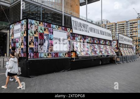 London, UK.  14 August 2024.  Official merchandise ('merch') stands in front of Brent Library outside Wembley Stadium ahead of Taylor Swift’s Eras Tour August concerts.  Taylor Swift performed at Wembley Stadium for three nights in June and will play five more nights commencing 15 August. Credit: Stephen Chung / Alamy Live News Stock Photo