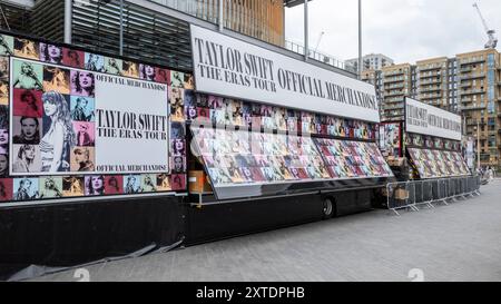 London, UK.  14 August 2024.  Official merchandise ('merch') stands in front of Brent Library outside Wembley Stadium ahead of Taylor Swift’s Eras Tour August concerts.  Taylor Swift performed at Wembley Stadium for three nights in June and will play five more nights commencing 15 August. Credit: Stephen Chung / Alamy Live News Stock Photo