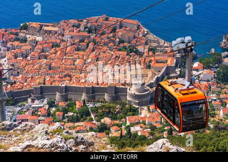 DUBROVNIK, CROATIA - JUNE 24, 2024: Dubrovnik cable car takes visitors on a 4-minute ride 778 meters up to a plateau of Moutain Srd which offers views Stock Photo