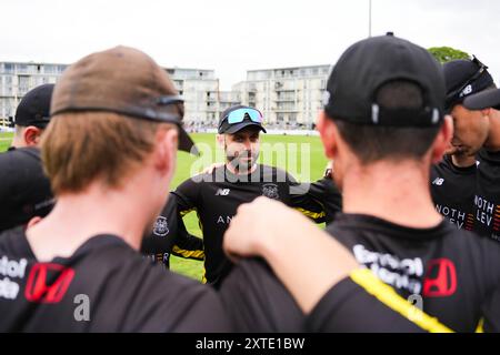 Bristol, UK, 14 August 2024. Gloucestershire's Jack Taylor leads the team talk in the huddle during the Metro Bank One-Day Cup match between Gloucestershire and Leicestershire. Credit: Robbie Stephenson/Gloucestershire Cricket/Alamy Live News Stock Photo