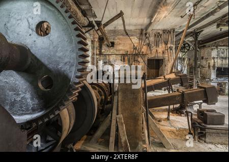 Workshop of a historic hammer mill smithy. Stock Photo