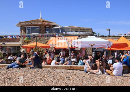 Trendy Coast Cafe at the quiet eastern end of Worthing's beach, in West Sussex, UK, on a hot, summer's Sunday. Stock Photo