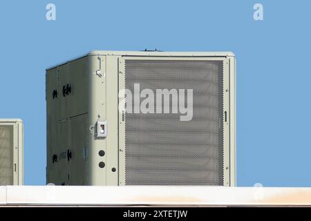 Horizontal shot of a commercial air conditioning unit on the roof of a retail store. Stock Photo