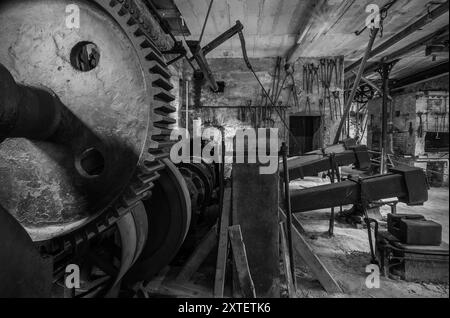 Workshop of a historic hammer mill smithy. Stock Photo