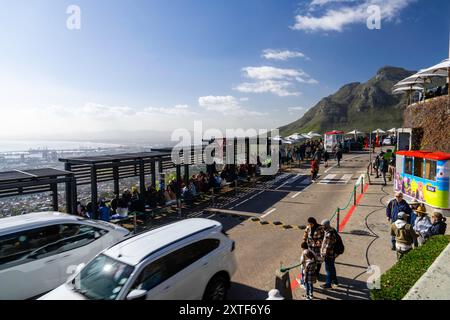 Tourists wait in line for their turn to ride the cable car up Table Mountain. Cape Town, South Africa taken from the lower tram area on Table Mountain Stock Photo