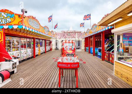 View to empty deck of Paignton Pier amusement arcade. Paignton, Devon, England Stock Photo