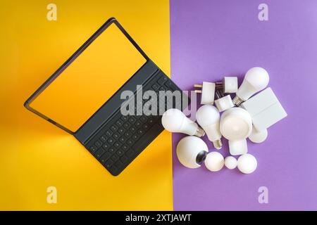 Smart home devices and laptop. Blank screen mockup. Remote control Smart gadgets. Stock Photo