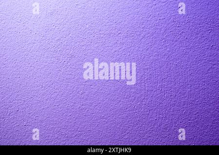 the wall is painted with purple paint with visible details Stock Photo