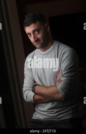 portrait of handsome latino man  with low lighting Stock Photo