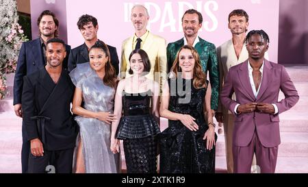 HOLLYWOOD, LOS ANGELES, CALIFORNIA, USA - AUGUST 14: Lucas Bravo, Lucien Laviscount, Paul Forman, Ashley Park, Bruno Gouery, Lily Collins, William Abadie, Philippine Leroy-Beaulieu, Arnaud Binard and Samuel Arnold arrive at the Los Angeles Premiere Of Netflix's 'Emily In Paris' Season 4 Part 1 held at The Egyptian Theatre Hollywood on August 14, 2024 in Hollywood, Los Angeles, California, United States. (Photo by Xavier Collin/Image Press Agency) Stock Photo