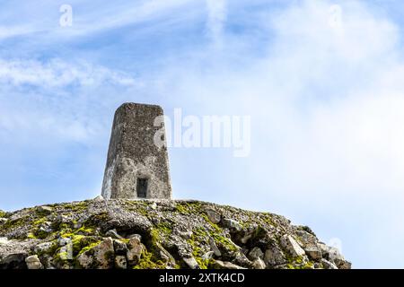 Summit marker at the top of Ben Nevis - highest mountain in the UK, Highlands, Scotland UK Stock Photo