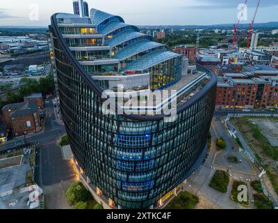 Aerial image of a modern glassed facade Co-operative headquarters office building in Manchester UK. Stock Photo