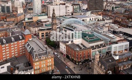 LEEDS, UK - AUGUST 10, 2024. .  An aerial view of the glass roof of The Trinity Shopping Mall in Leeds sympathetically built around older architecture Stock Photo